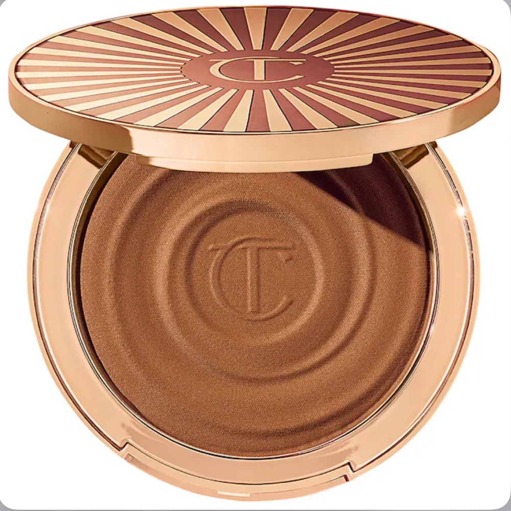 NEW Charlotte Tilbury
Beautiful Skin Sun-Kissed Glow Cream Bronzer